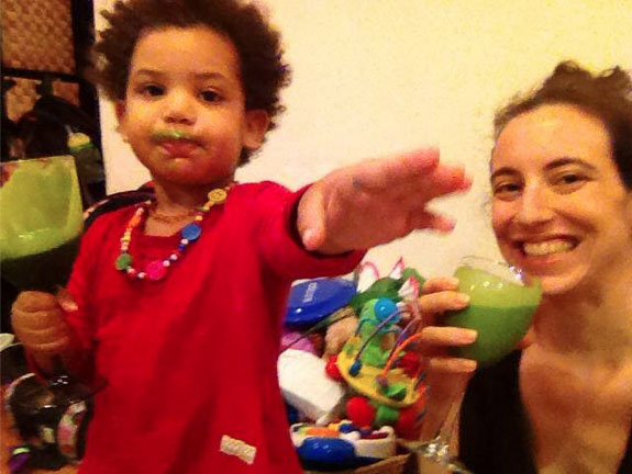 Me and my daughter drinking our green smoothies on our cleanse.